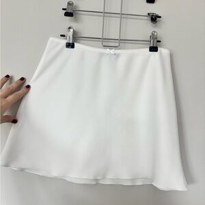 Brandy Melville slip mini skirt
One size white